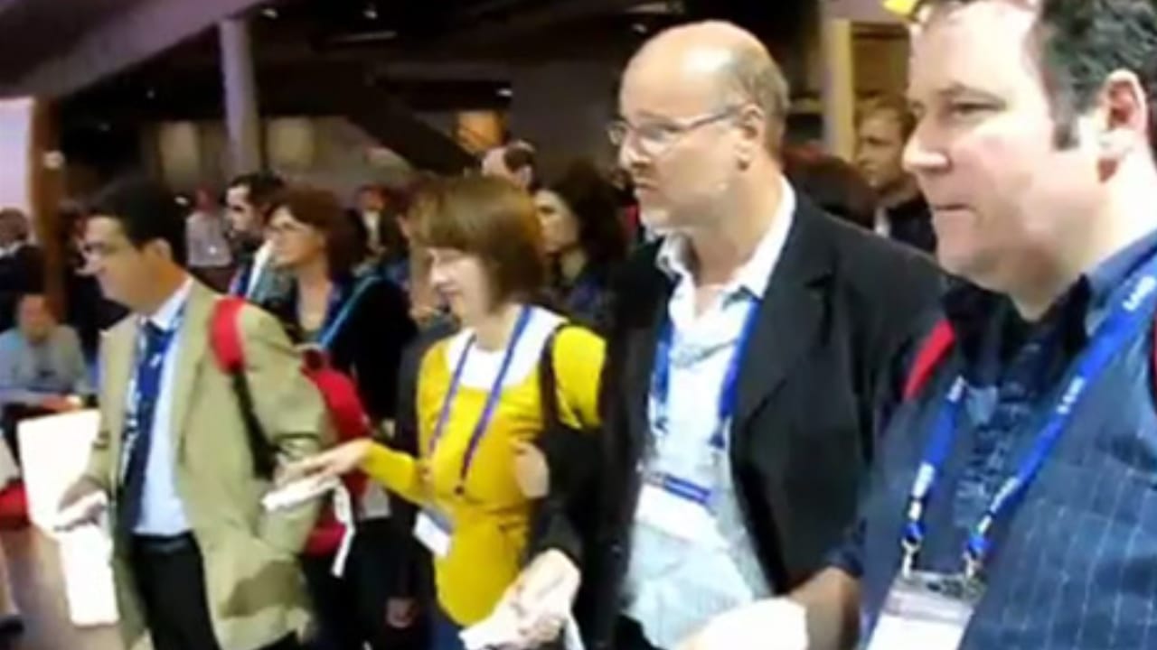 Conference visitors gathered at the Bayer Wii game booth